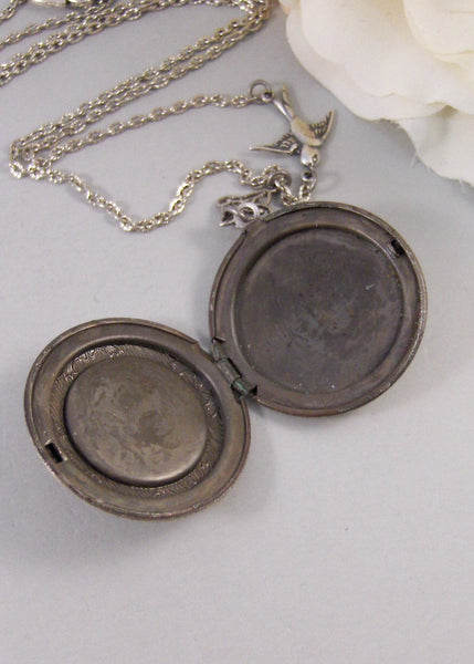 Tranquility,Locket,Antique Locket,Silver Locket,Bird,Sapphire,Blue,Ocean,Bird Locket,Bird Jewelry. Handmade jewelry by Valleygirldesigns.
