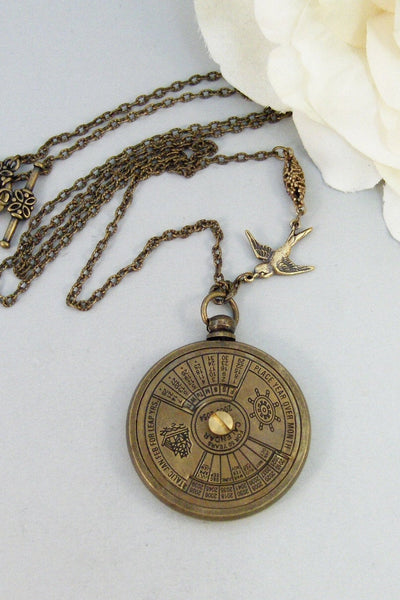 Nautical Calendar,Locket,Necklace,Brass Locket,Steampunk,Antique Locket,Compass,Calendar,Vintage. Handmade jewelry by valleygirldesigns.