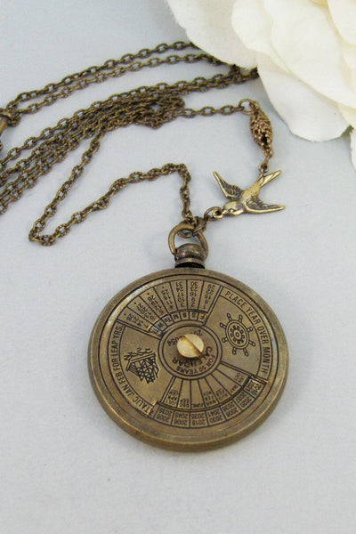 Nautical Calendar,Locket,Necklace,Brass Locket,Steampunk,Antique Locket,Compass,Calendar,Vintage. Handmade jewelry by valleygirldesigns.