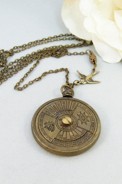 Nautical Calendar,Locket,Necklace,Brass Locket,Steampunk,Antique Locket,Compass,Calendar,Vintage. Handmade jewelry by valleygirldesigns.