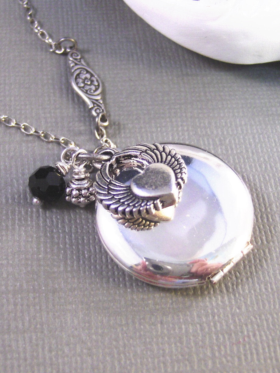 Aphrodite,Locket,Silver Locket,Black,Wings,Heart, Wing Locket,Antique Locket. Handmade jewelery by valleygirldesigns.