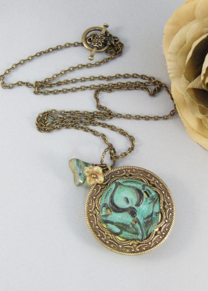Sage Lily,Brass Locket,Patina Locket,Flower,Woodland,Lily,Green,Teal,Aqua,Patina,Virdigris. Handmade jewelery by valleygirldesigns on Etsy.