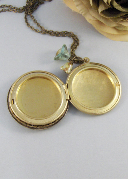 Sage Lily,Brass Locket,Patina Locket,Flower,Woodland,Lily,Green,Teal,Aqua,Patina,Virdigris. Handmade jewelery by valleygirldesigns on Etsy.