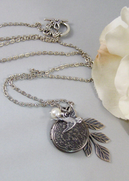 Peaceful Sparrow,Locket,Silver Locket,Bird,Wing,Branch,Twigg,Sparrow,Antique Locket,Steampunk. Handmade jewelry by valleygirldesigns.