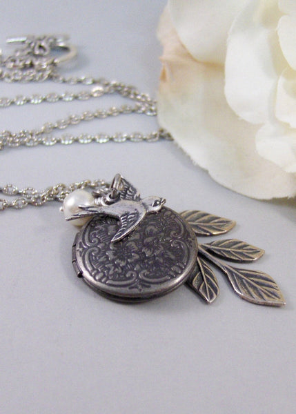 Peaceful Sparrow,Locket,Silver Locket,Bird,Wing,Branch,Twigg,Sparrow,Antique Locket,Steampunk. Handmade jewelry by valleygirldesigns.