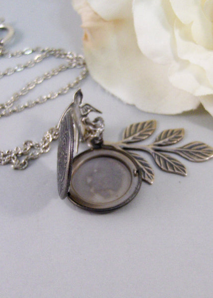 Peaceful Sparrow,Locket,Silver Locket,Bird,Wing,Branch,Twigg,Sparrow,Antique Locket,Steampunk. Handmade jewelry by valleygirldesigns.