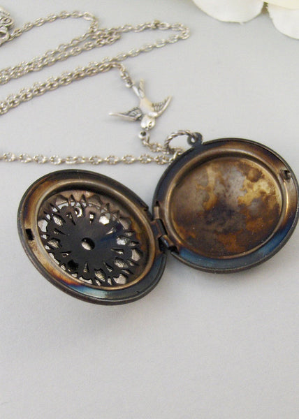 Little Traveler,Locket,Silver Locket,Bird,Wing,Globe,World,Sparrow,Antique Locket,Steampunk. Handmade jewelry by valleygirldesigns.