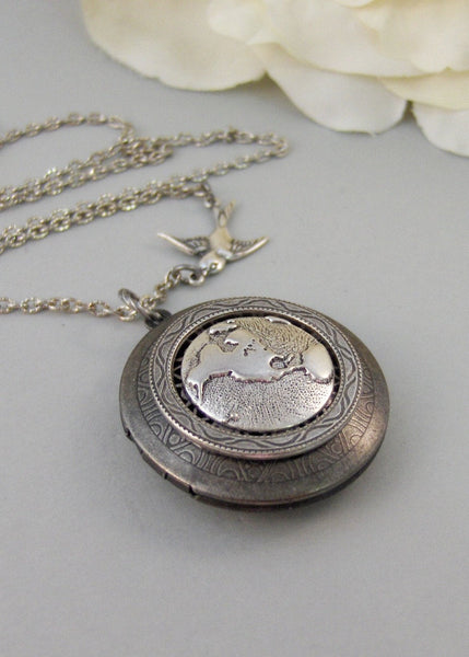 Little Traveler,Locket,Silver Locket,Bird,Wing,Globe,World,Sparrow,Antique Locket,Steampunk. Handmade jewelry by valleygirldesigns.