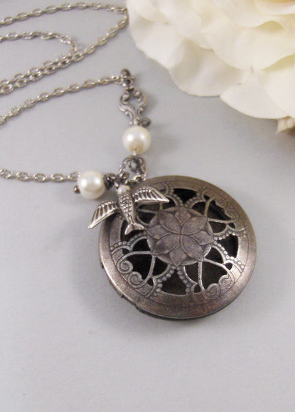 Nightengale,Locket,Silver Locket,Bird,Sparrow,Pearl,Woodland,Scent,Perfume,Antique Locket,Steampunk. Handmade jewelry by valleygirldesigns.