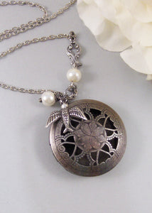 Nightengale,Locket,Silver Locket,Bird,Sparrow,Pearl,Woodland,Scent,Perfume,Antique Locket,Steampunk. Handmade jewelry by valleygirldesigns.