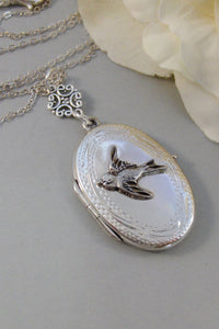 Graceful Songbird, Locket,Sterling Silver Locket,Bird Locket,Silver Necklace,Bird,Sparrow,Wing.  Handmade jewelery by valleygirldesigns.