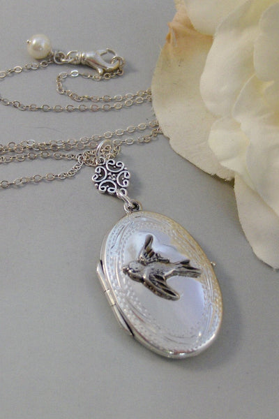 Graceful Songbird, Locket,Sterling Silver Locket,Bird Locket,Silver Necklace,Bird,Sparrow,Wing.  Handmade jewelery by valleygirldesigns.