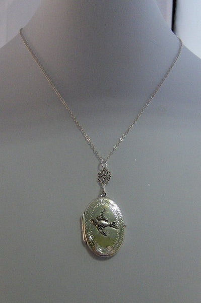 Graceful Songbird, Locket,Sterling Silver Locket,Bird Locket,Silver Necklace,Bird,Sparrow,Wing.  Handmade jewelery by valleygirldesigns.